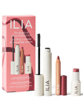 Ilia makeup set with packaging on a white background